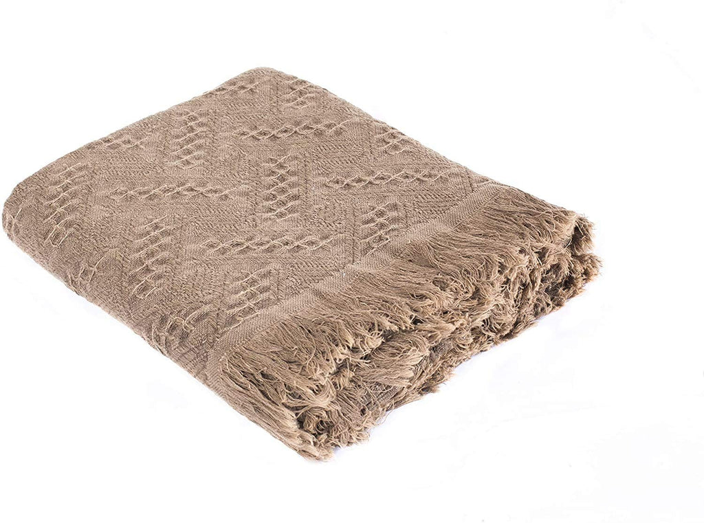 Lightweight cotton throw on sofa
