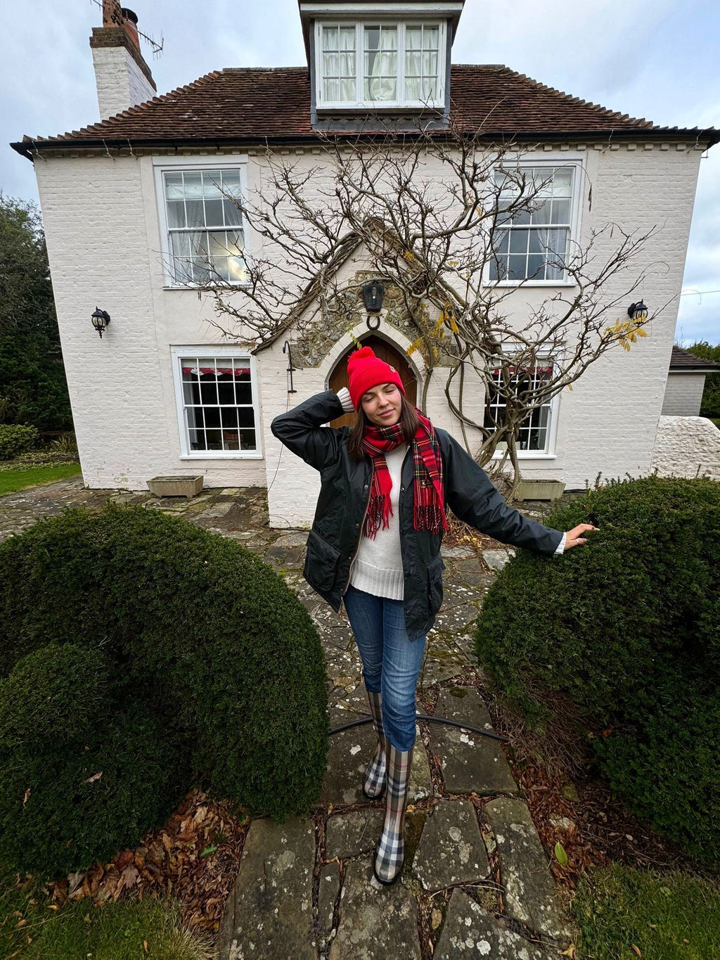 Scarlet red cuffed pom pom beanie, view 4